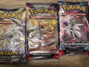 Cartes Pokémon à collectionner, booster packs de cartes à jouer et à échanger pour fans de Pokémon, featuring Éclat et Violet, taille paradox, et étoiles scintillantes.