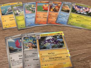 Carte Pokémon de la gamme TCG avec illustration de Pokémon et détails de jeu, mise en valeur pour collectionneurs et amateurs de jeux de cartes stratégiques.