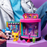 Jouets pour enfants LOL Surprise dans une boutique miniature colorée avec accessoires et figurines mignonnes, idéale pour les jeux créatifs et l'imagination.