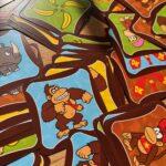 Cartes à jouer de personnages de Donkey Kong avec des singes et des dessins colorés, idéal pour jeux de société familiaux ou éducatifs.