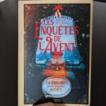 Livre illustré de 24 énigmes pour attendre Noël avec plaisir et esprit de Noël, idéal pour enfants et adultes.