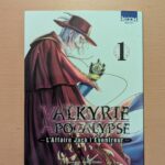 Valkyrie Apocalypse manga cover featuring a character in a red cloak and hat, holding a pocket watch, with a fantasy art style, showcasing illustration by Keita Iizuka, part of the Air-Gaming collection.