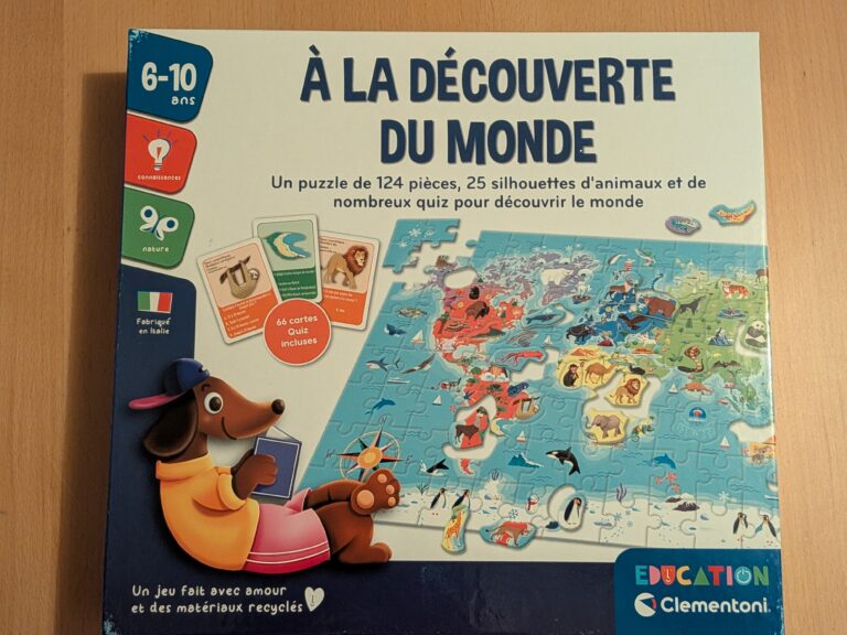Puzzle éducatif de 124 pièces sur le thème du monde, avec 25 silhouettes d'animaux, idéal pour découvrir la géographie et la faune pour les enfants de 6 à 10 ans.