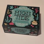 Jeu de placement de tuiles relaxant sur le thème de la mer, idéal pour deux joueurs, avec illustrations colorées et design attrayant.