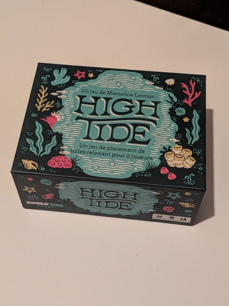 Jeu de placement de tuiles relaxant sur le thème de la mer, idéal pour deux joueurs, avec illustrations colorées et design attrayant.