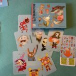 Jeu Toktooyou, un jeu d'ambiance captivant avec des personnages colorés et des illustrations amusantes, parfait pour des soirées entre amis ou en famille.