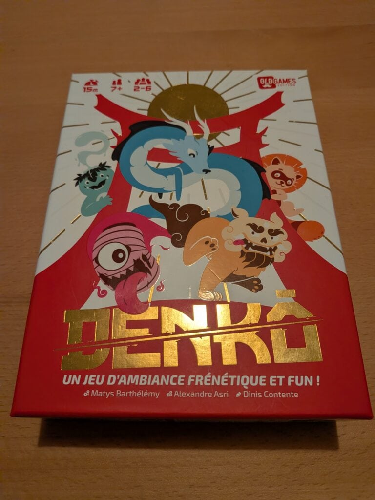 Jeu de société Denko, avec un dragon et des personnages colorés, parfait pour créer une ambiance ludique et conviviale lors de vos soirées en famille ou entre amis.