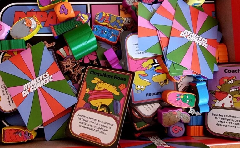 Collection de jeux de société, cartes, et accessoires pour jeux de plateau, avec des illustrations vives et variées.