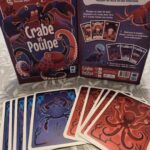 Jeu de cartes Crabe vs Poulpe avec illustrations de crabes et poulpes pour une partie stratégique et amusante.