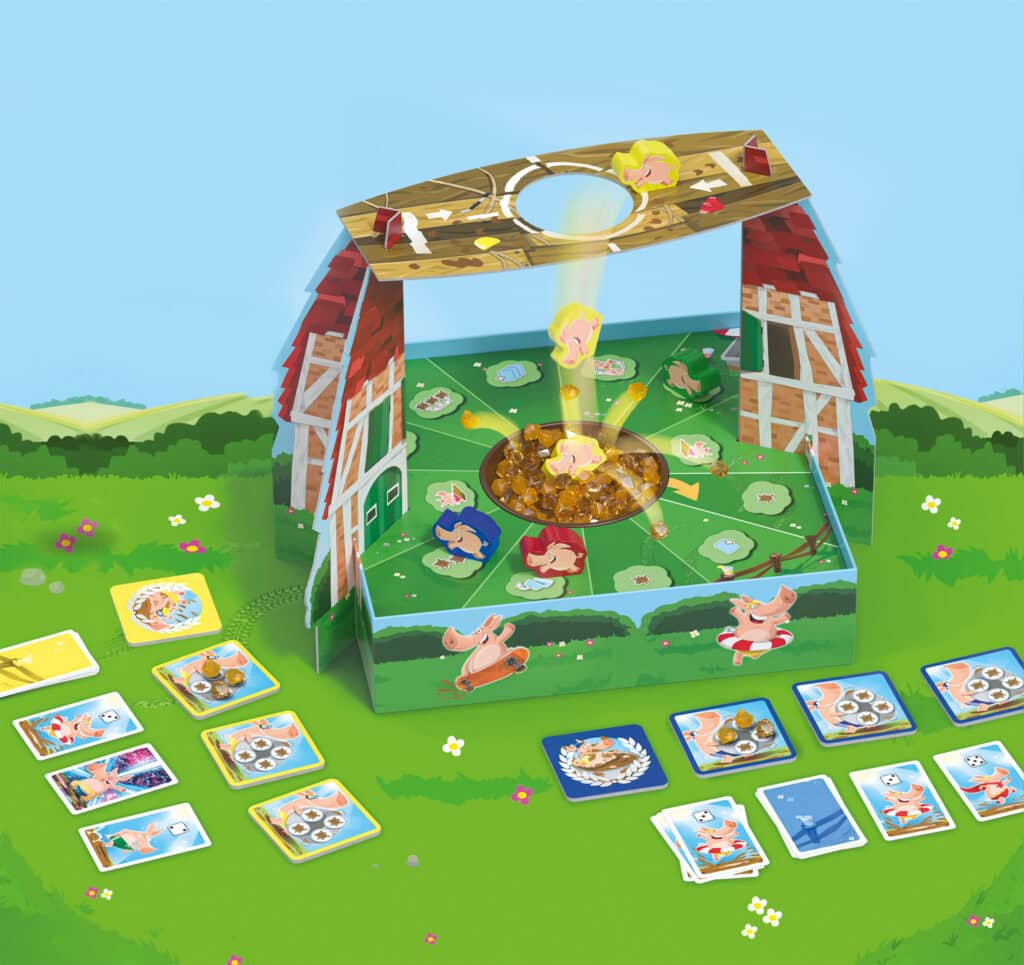 Jeu de société pour enfants avec figurines et cartes sur un tapis vert en plein air.