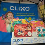 Jeu de construction Clixo pour enfants avec pièces magnétiques colorées et créatives, idéal pour stimuler l'imagination des jeunes.