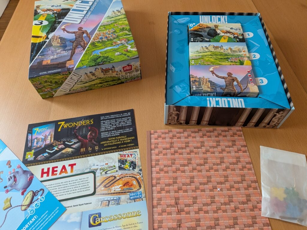 Jeu de société Unlock! avec cartes et boîte, parfait pour les amateurs de jeux de société et d'aventures.