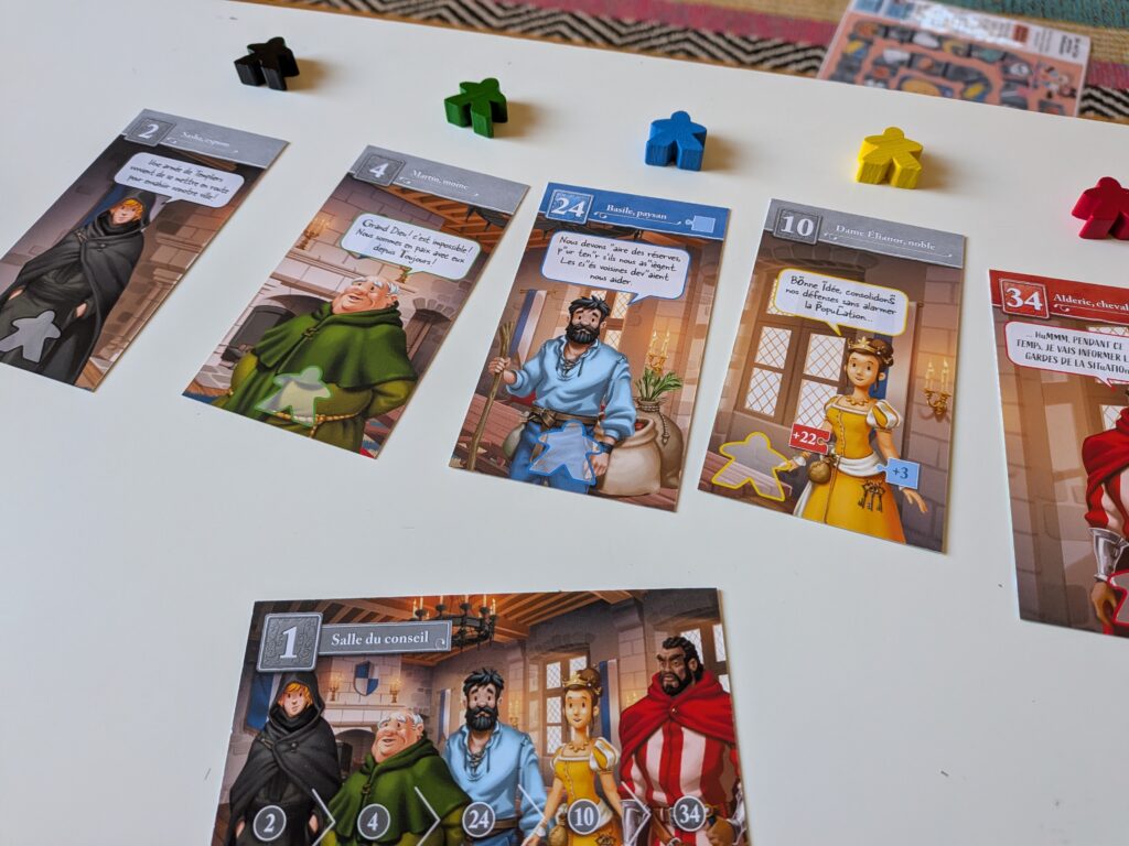 Jeux de société avec personnages colorés et cartes de jeu pour une expérience immersive.